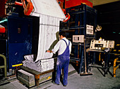 Worker in a rubber manufacturing plant