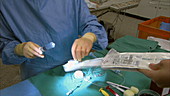 Doctor and Nurse preparing syringe