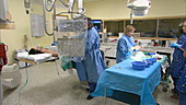 Doctors and nurses in operating room