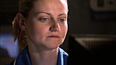 Nurse using computer in hospital