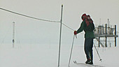 Scientist skiing to Flux mast, Antarctica