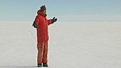 Researcher walking in Antarctica