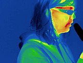 Thermogram of girl eating ice lolly