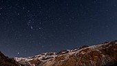 Orion and Sirius over mountains