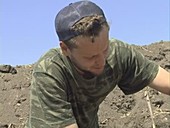 Archaeologist working on site