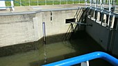 Canal lock lowering