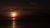 Sunset over sea, timelapse