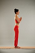 Sun salutation - Step 1: stand up straight, hands together
