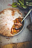 Pulled pork pie with autumn vegetables