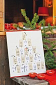 Advent calendar with hand-written, personal gift cards hand-made from paper tags