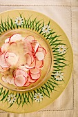 Radish salad on a rustic plate