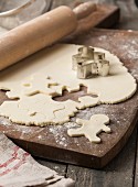 Gingerbread men being cut out