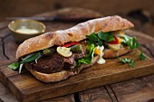 Baguette sandwich with beef and mixed pickles