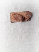 Slices of spelt bread on a board