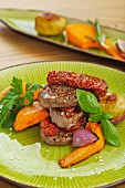 Beef fillet with dried tomatoes and pumpkin