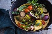 Aubergine curry in a cooking pot