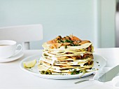 A stack of crêpes with smoked salmon and capers for Easter