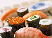 Various types of sushi and maki (close-up)