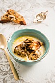 Creamy root vegetable soup with mushroom crostini