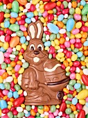 Colourful sugar eggs and a chocolate bunny