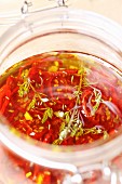 Preserved sun-dried cherry tomatoes with oil, garlic and thyme