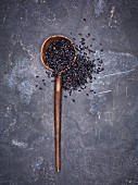 Black rice on a wooden spoon