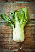 Bok choy on a wooden surface