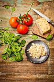 Ingredients for tomato-infused barley risotto with tofu and spinach