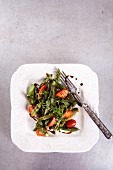 Green asparagus salad with tomatoes, thyme and balsamic vinegar