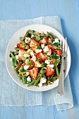 Green bean and strawberry salad with feta cheese and mint