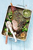 Slow roasted leg of lamb with pesto and broccoli