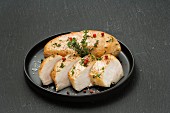 Chicken breast with herbs and pink pepper