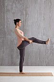 Standing single leg balance (pilates) – Step 1: stand, raise leg