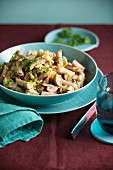 Penne pasta with Chinese cabbage and creamy mushroom sauce