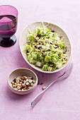 Brussels sprouts salad with pear and hazelnuts