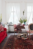 Persian rug in artistic interior in shades of red