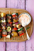 Pork kebabs with vegetables (potatoes, courgette, mushrooms, peppers and red onions)