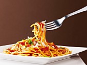 Spaghetti with tomato sauce, basil and Parmesan