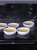 Crème brûlée setting in a bain-marie