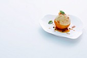Almond mousse on a poached peach