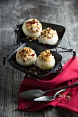 Stuffed onions with capers and thyme