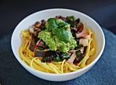 Gluten-free pasta with avocado, chard and aubergines