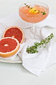 Rhubarb and grapefruit cocktail with thyme