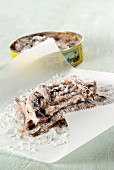 Sardines preserve in salt on a piece of white parchment paper