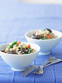 Brown rice risotto with vegetables and mushrooms