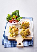 Baked potatoes with cheese and ham