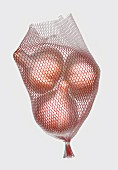 Bulbs of garlic in a net