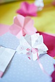 Romantic paper garland of origami flowers