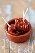 Dried tomatoes with toothpicks
