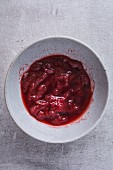 A bowl of strawberry compote (seen from above)